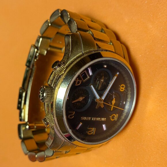 Michael Kors Ladies Black/Yellow Gold Toned Watch